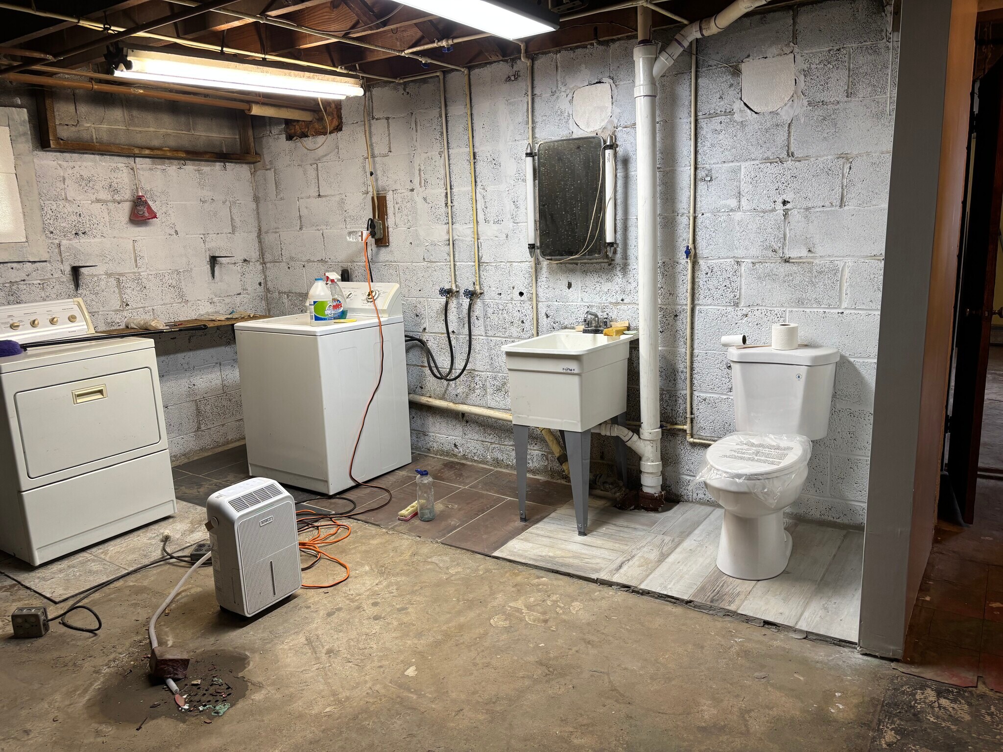 Laundry, 1/2 bath in basement - 1 Mars St