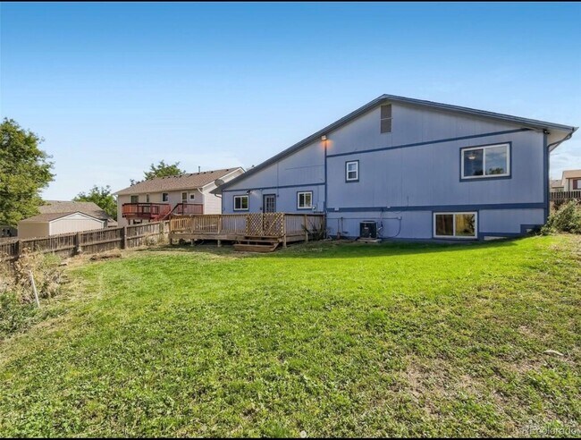 Building Photo - 1293 E 97th Ave