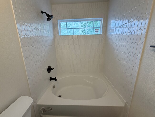 Building Photo - Remodeled Top-Level Condo in Pool Community Near Shopping & Dining
