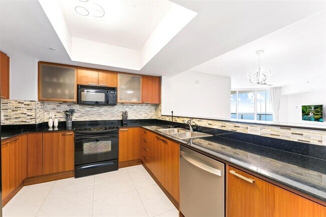 Building Photo - 16699 Collins Ave