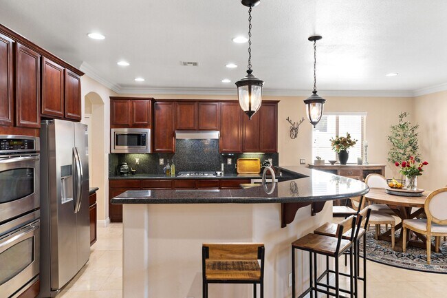 Building Photo - Spacious Mountain’s Edge Home with Den, Sunroom, 3-Car Garage & Private Spa Retreat