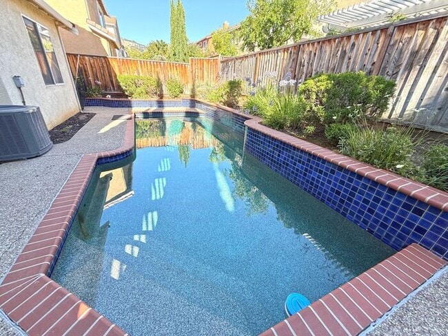 Building Photo - Beautiful Evergreen Home with Pool on Corner Lot -- Walk to Park and Chaboya Middle!