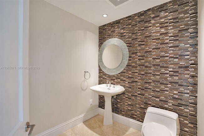 Building Photo - 10295 Collins Ave