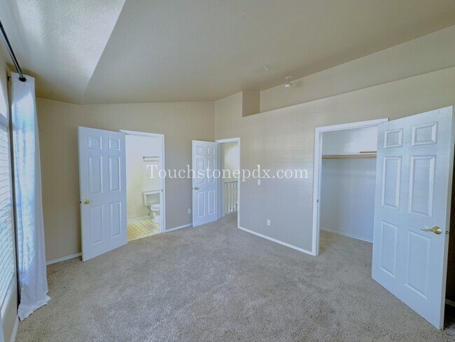 Building Photo - Light Filled 3 Bedroom Townhome with Deck, Attached Garage, and AC