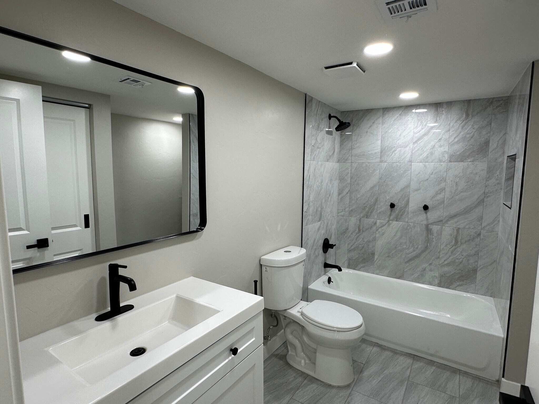 Modern main bathroom with designer accents - 1331 W Speedway Blvd