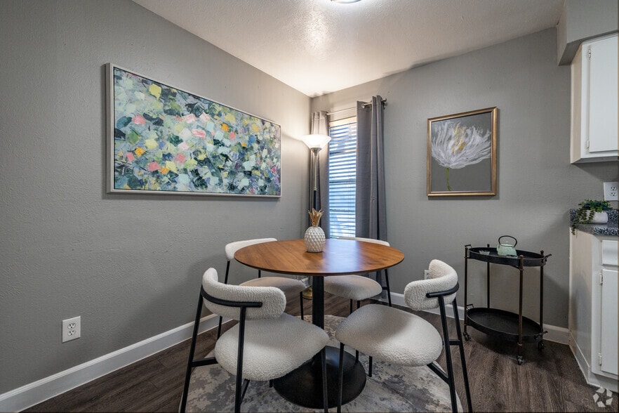 2BR, 1.5BA - 1,018SF - Dining Area - Villages of Royal Lane
