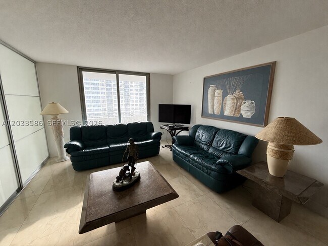 Building Photo - 5555 Collins Ave