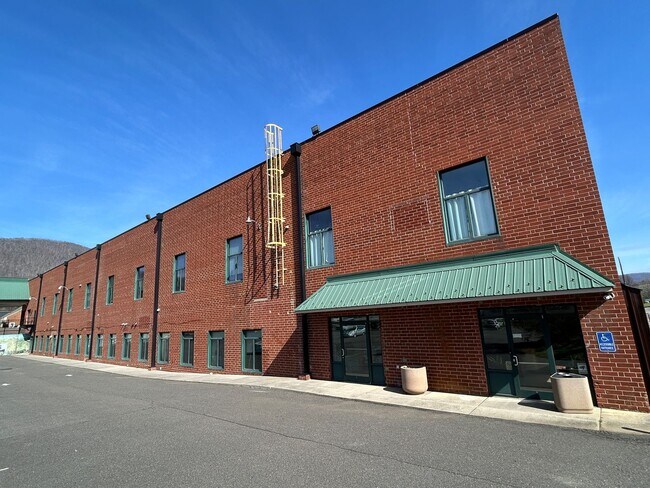 Building Photo - Industrial Style. Downtown Energy. Elevated Living.