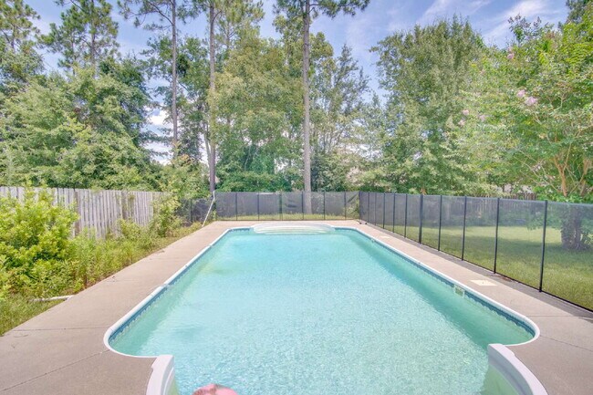 Building Photo - Spacious 4BR Pool Home with Modern Upgrade...