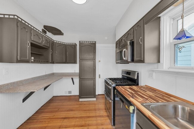 Building Photo - NORWOOD – Stunning Old-World Charm with Modern Comforts