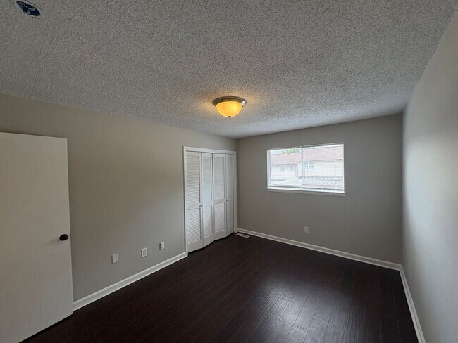 Building Photo - Four Bedroom Townhome Available Now