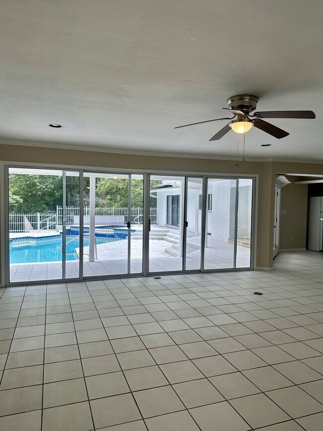 Building Photo - Upgraded 4BR/3.5BA Pool Home in Prestigiou...