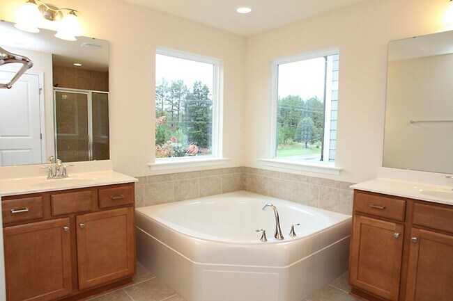 Building Photo - Low Maintenance Detached Home in Central Triangle Location!