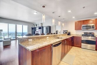 Building Photo - Fully Furnished Luxury Condo at The Ogden – Downtown Living at Its Finest!