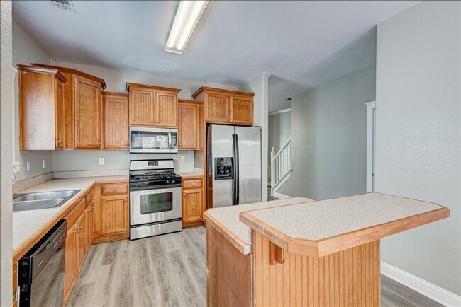 Building Photo - Welcome to this stunning 4-bedroom, 2.5-ba...