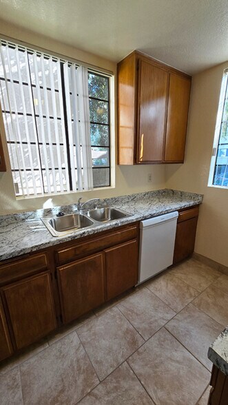 Kitchen - Bran New Counter Tops - 12821 Caswell Ave