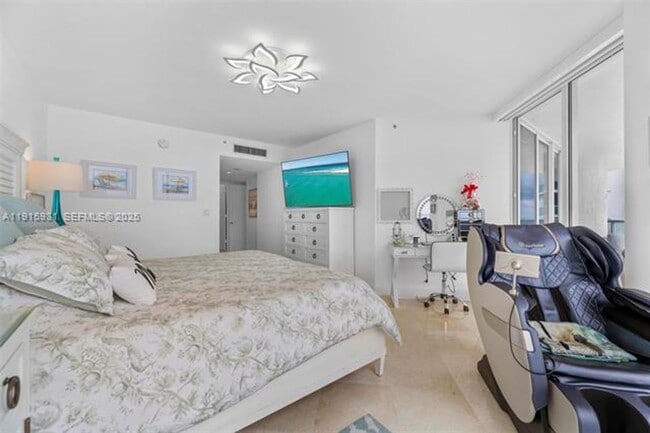 Building Photo - 18671 Collins Ave