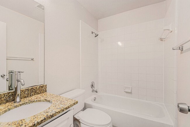 Building Photo - Discover your new home in this spacious 3-bedroom, 2-bath duplex located in the charming city of ...