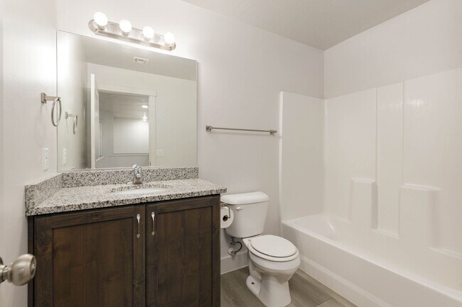 Building Photo - 3 bed | 2.5 bath | 2-car Townhome with Was...