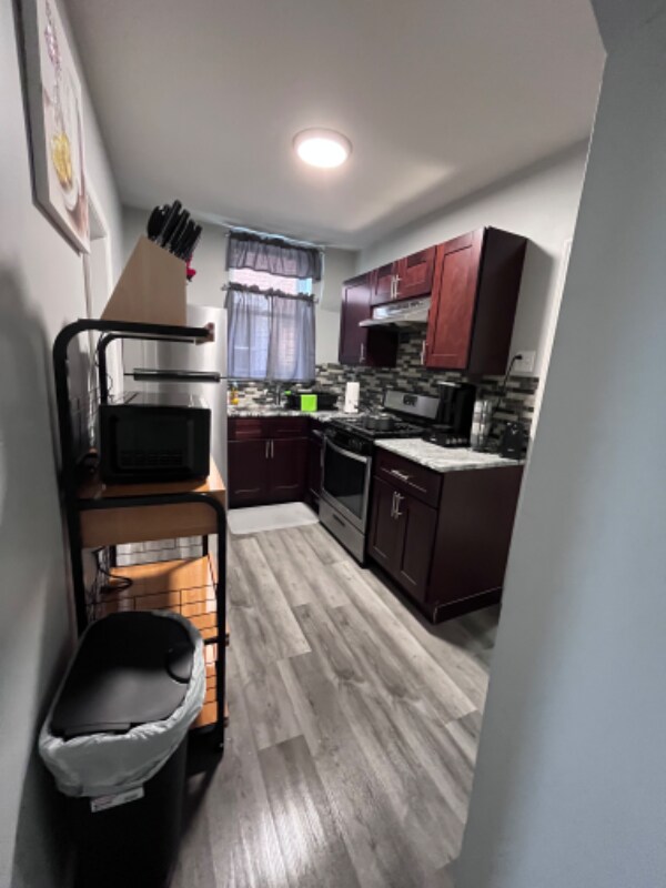 Building Photo - 5235 Woodland Ave