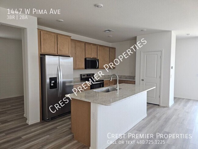 Building Photo - 1447 W Pima Ave