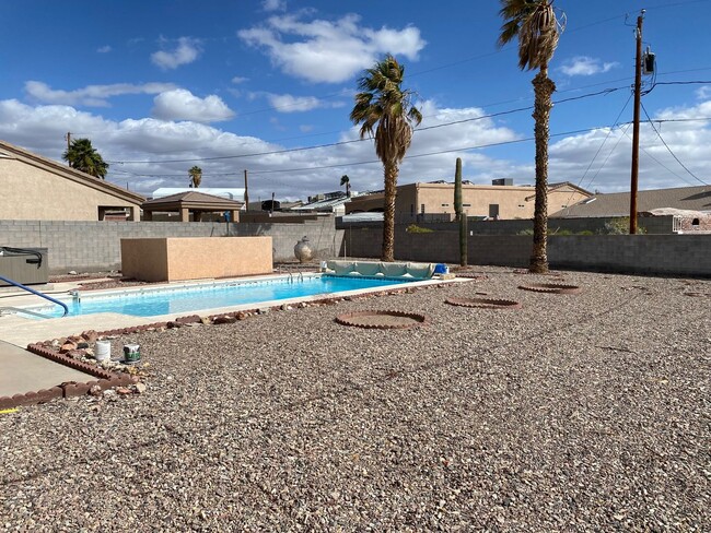 Building Photo - 3 Bedroom - 2 Bath Pool Home