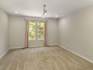 Building Photo - This light filled & charming home in a convenient location!