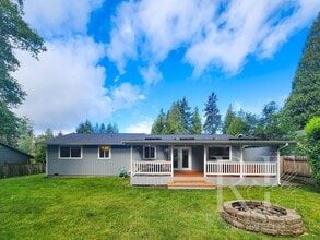 Building Photo - Rambler with Fantastic Covered Deck & Community Pool