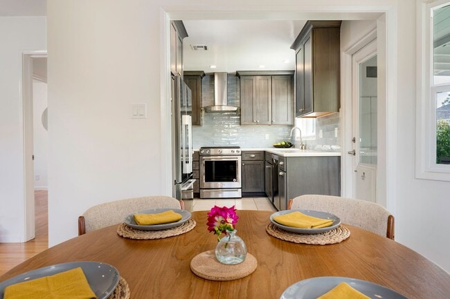 Building Photo - South of Conant 3 Bedroom, 1 Bath Home on over 5000 Square Feet, an entertainers dream!