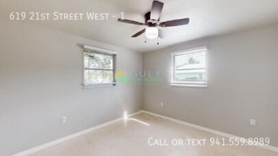 Building Photo - 619 21st St W