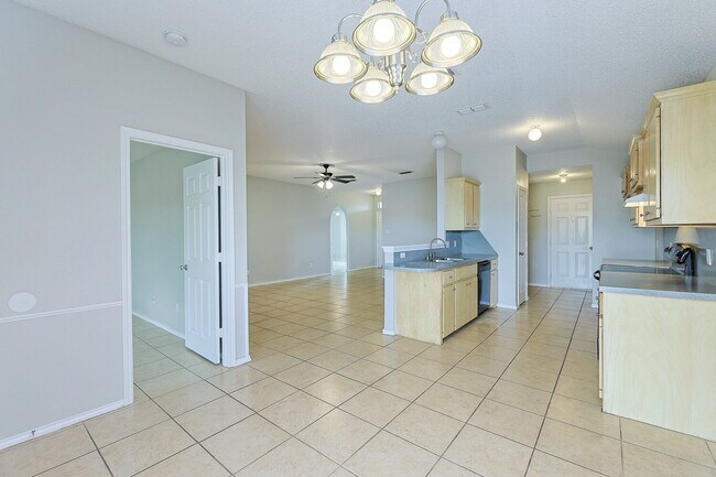 Building Photo - "Spacious 3-Bedroom Haven with 2 Full Baths – 1,592 Sq Ft with Lawn Care Included!"