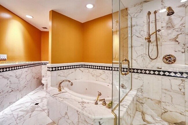 Building Photo - 10225 Collins Ave