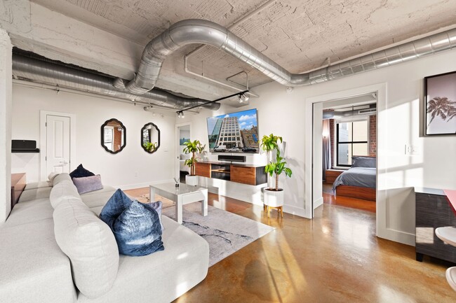 Building Photo - Fully Furnished Designer Loft with Parking & Monument Views!