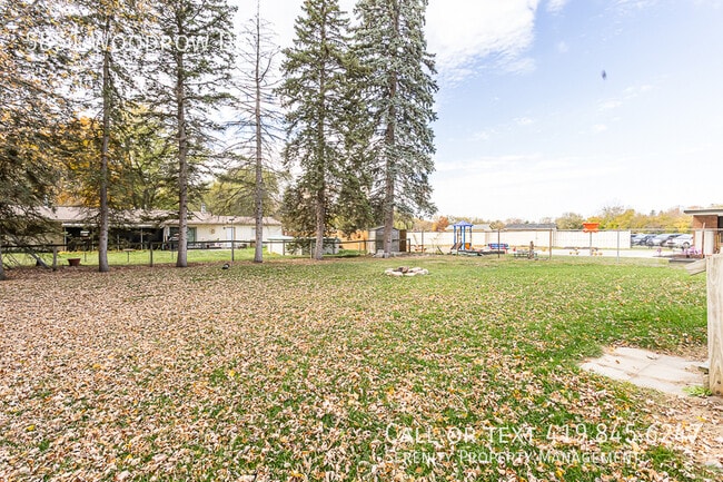 Building Photo - 5851 Woodrow Dr