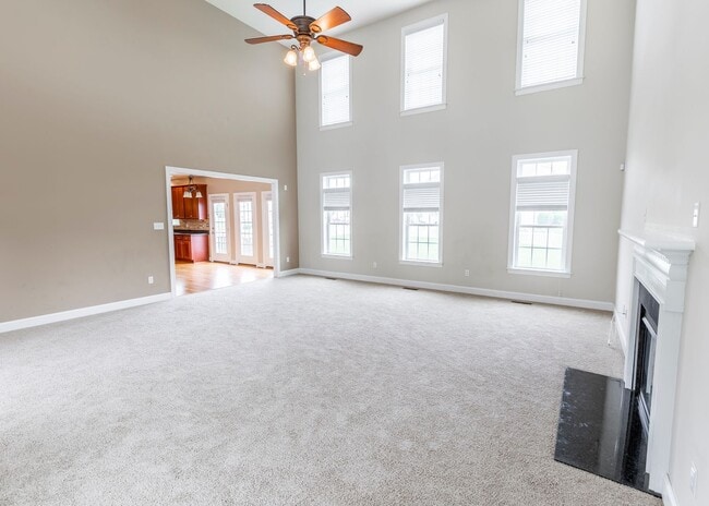 Building Photo - Huge house with vaulted ceilings and fenced in rear yard