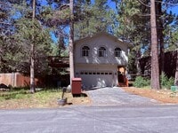 Building Photo - Mountain cabin with garage and fenced backyard