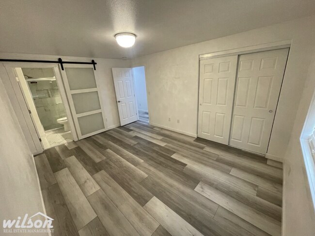 Building Photo - 3 Bed, 2 Bath Home with a Two-Car Garage, Fenced Backyard, and Lawn Care Included