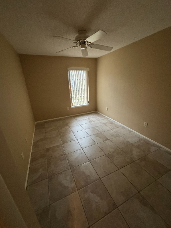 Building Photo - 3999 NW Cinnamon Tree Cir