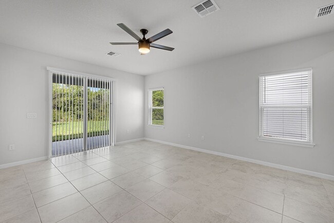 Building Photo - Brand-New 4BR Home with Tile Floors & Quartz Kitchen & Conservation Views