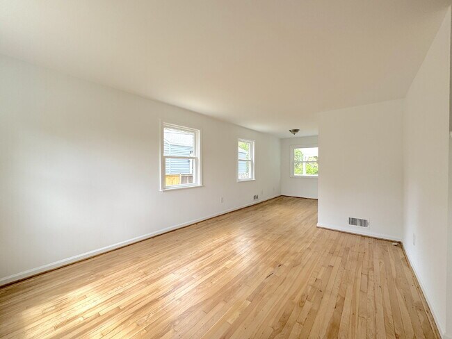 Building Photo - Charming 2BR Townhome with Finished Basement, Fenced Yard & Private Driveway Near Huntington Metro