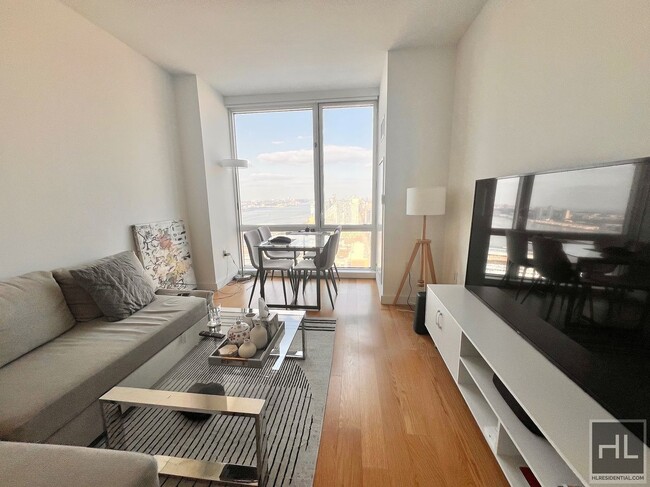 Building Photo - Furnished Luxury 1BR! WD in unit! 54th flo...