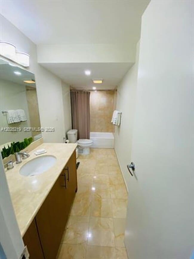 Building Photo - 10275 Collins Ave