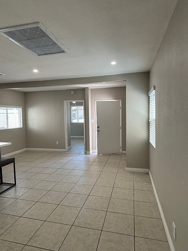 Building Photo - Cozy, Updated, and Pet-Friendly — Your New...