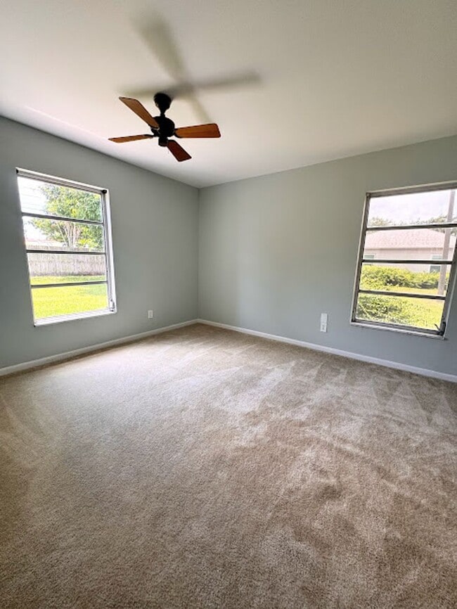 Building Photo - Stylish Seminole Condo with Private Garage in Chateaux de Bardmoor 55+ Community