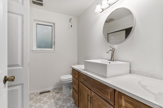 Building Photo - Spacious 4-Bedroom Home with Scenic Views & Versatile Living Spaces