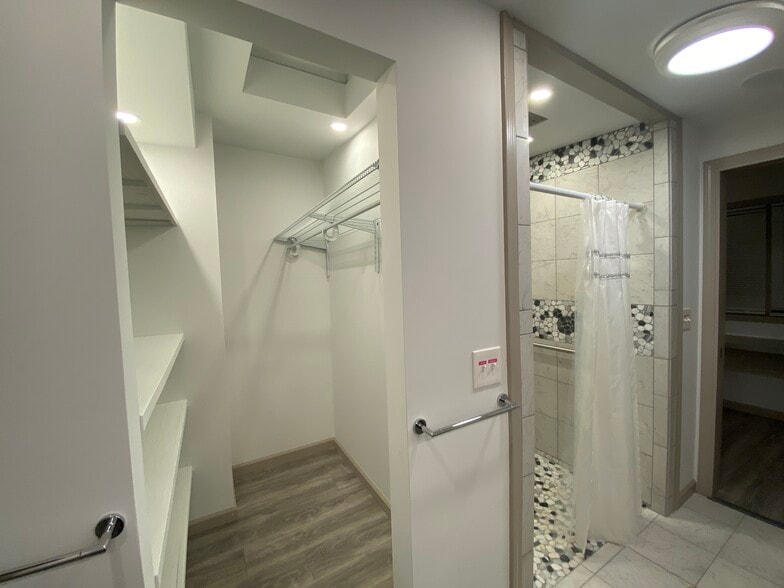 Master bath walk in closet. - 3716 Claudine St