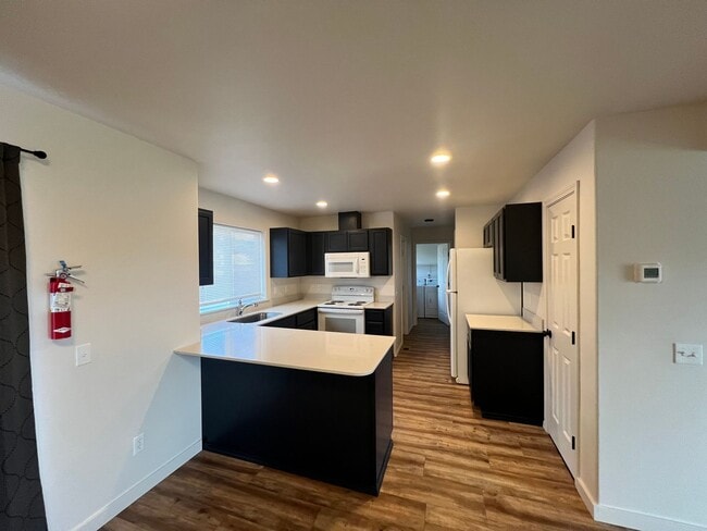 Building Photo - Fresh Paint and Flooring! Great Value and ...