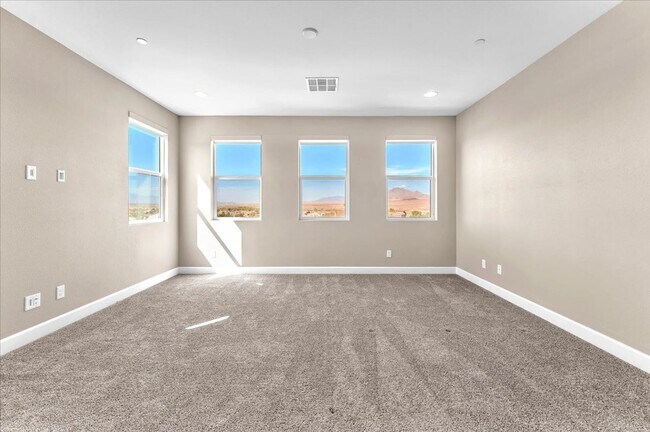 Building Photo - 4-Bedroom Tuscany Townhome with Strip & Golf Course Views