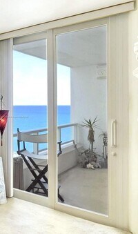 Building Photo - 5005 Collins Ave