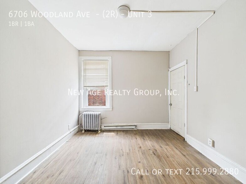 Building Photo - 6706 Woodland Ave